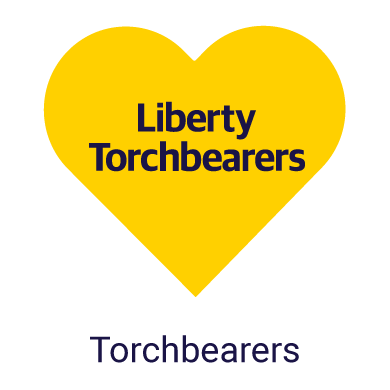 Liberty Torchbearers written in a yellow heart