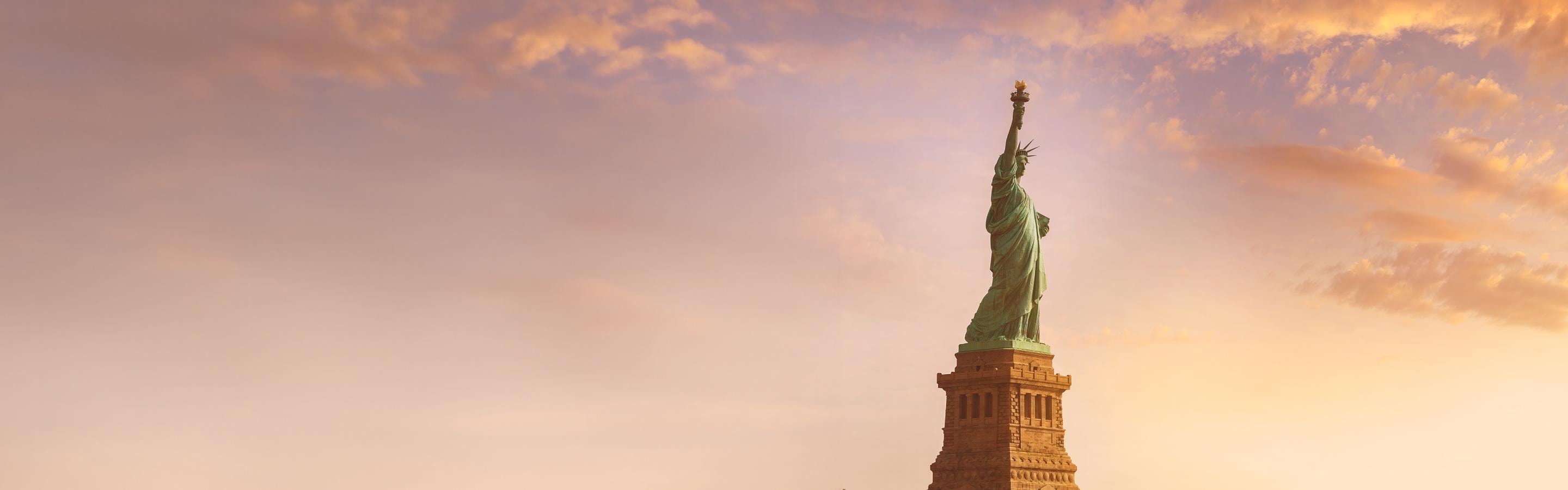 Sunset view of Statue of Liberty