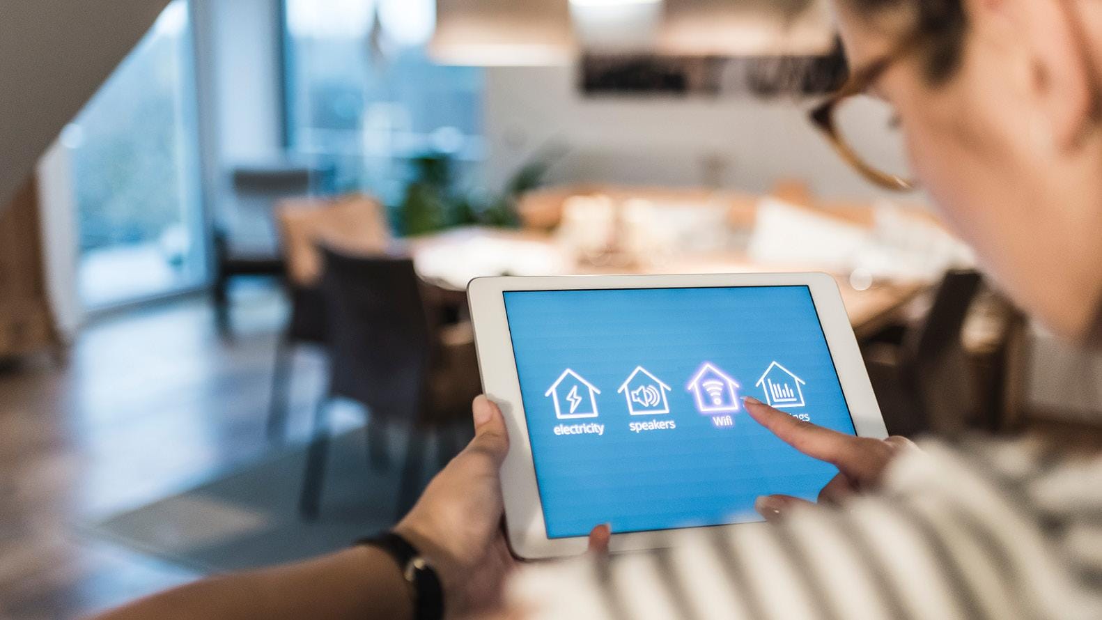 Person using an ipad in a home