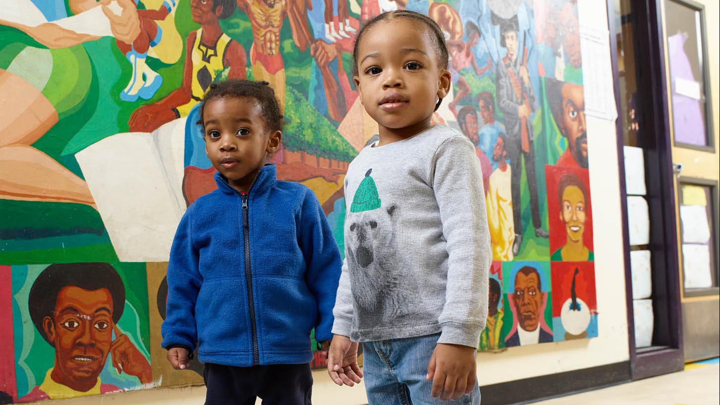 (slide 4 of 7) Two young children at Crispus Attucks Children's Center. 