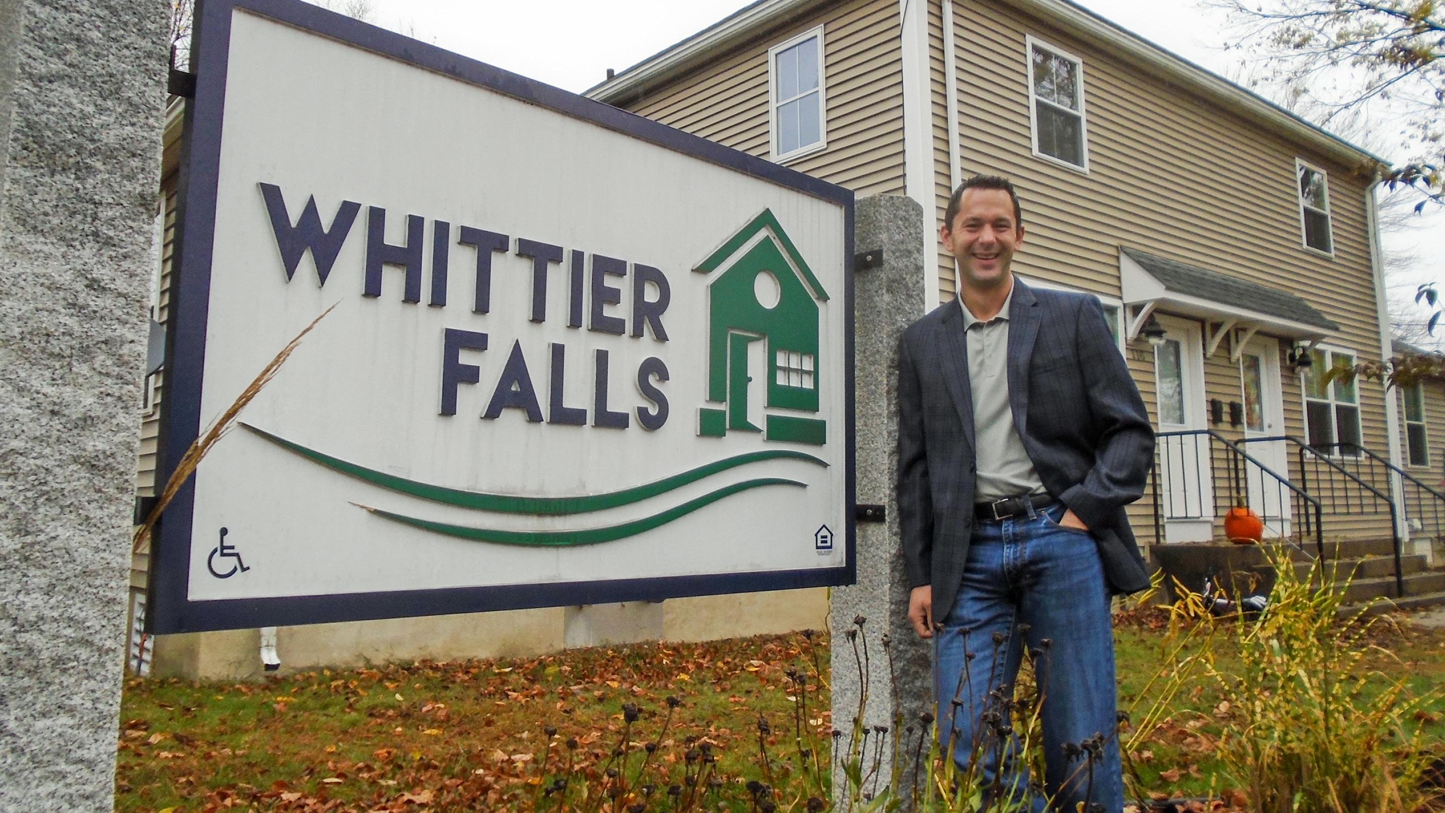 (slide 1 of 4) Liberty Mutual employee volunteering at Whittier Falls. 