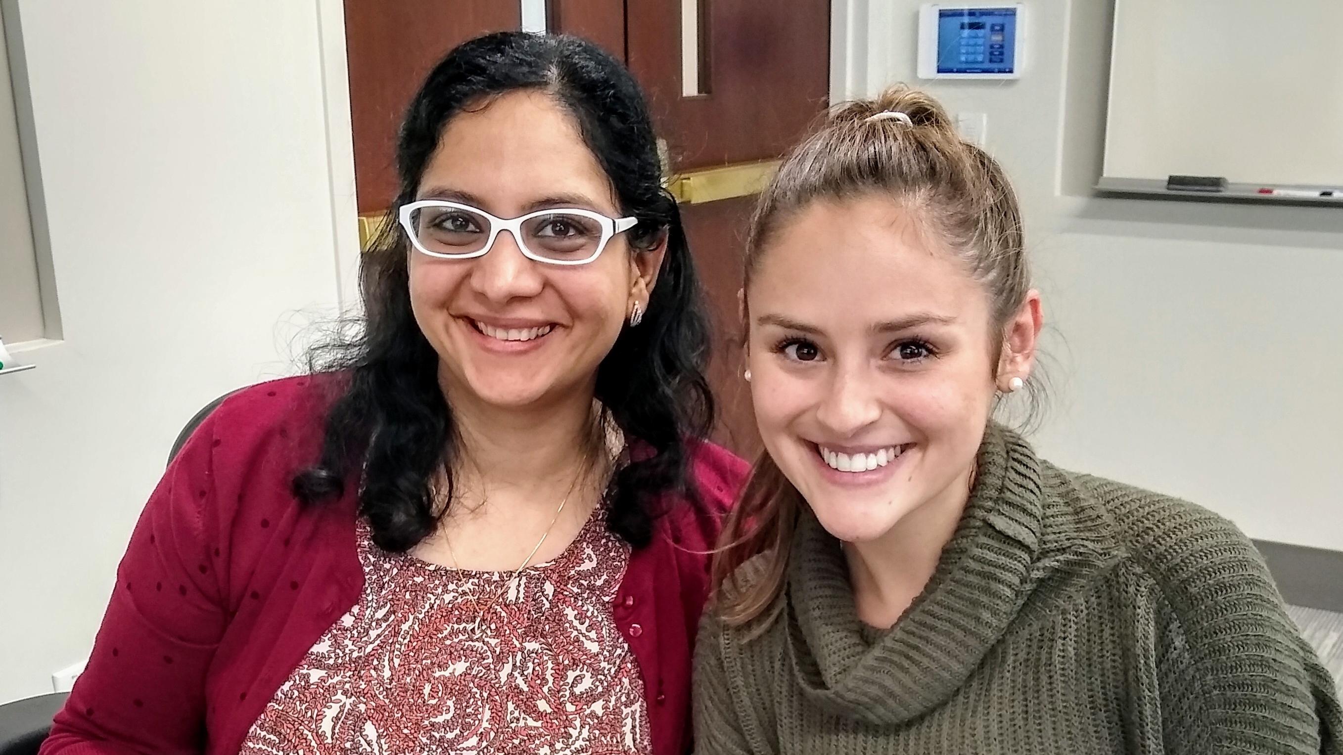 (slide 4 of 4) Two members of the Liberty Mutual Corporate Strategy and Research team during an Alumni lunch. 