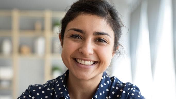 Female employee smiling to camera