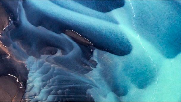 Climate Transition Center header atop blue, green, brown liquid background