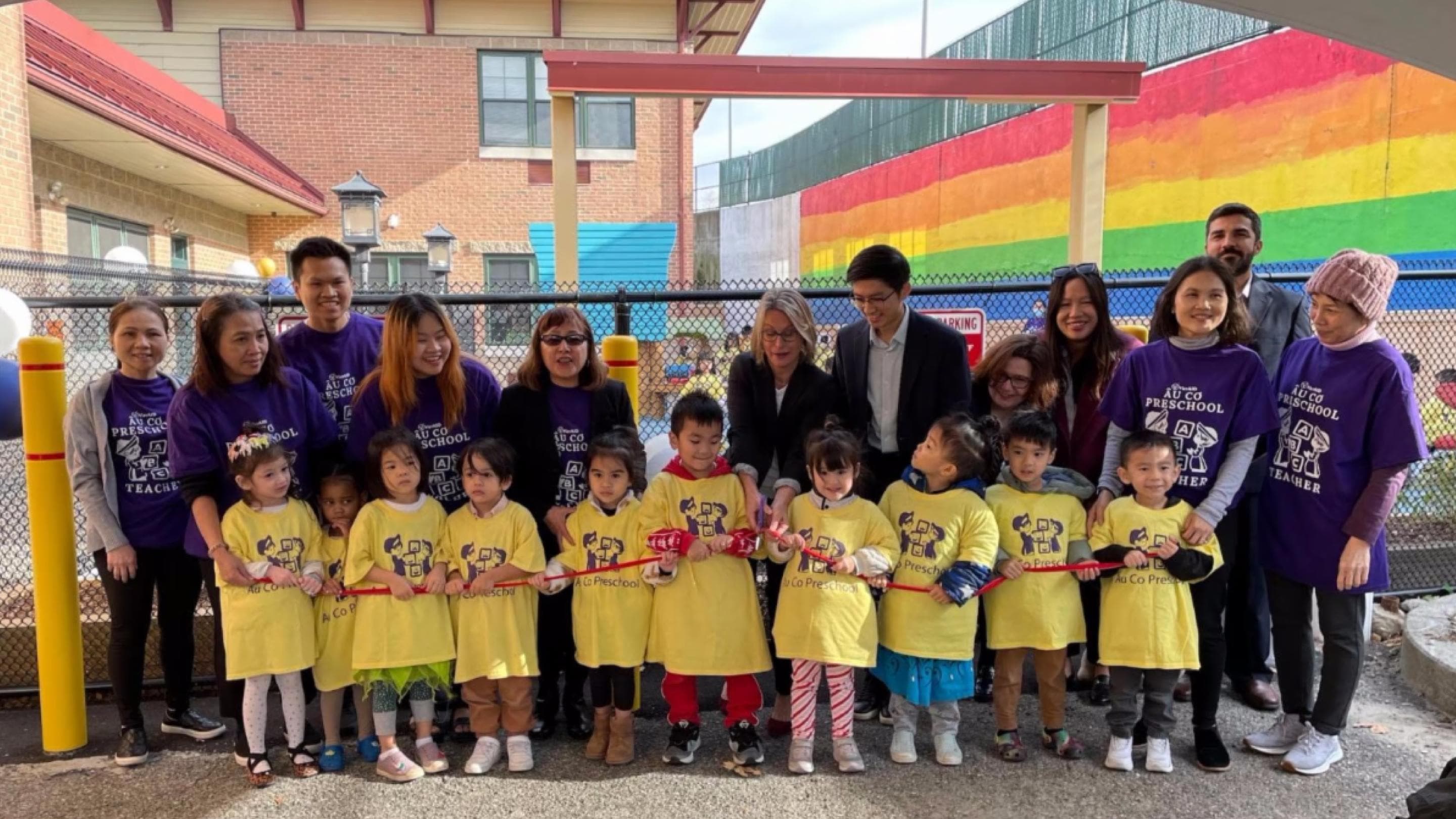 (slide 5 of 5) Group photography of children in yellow T-shirts. 