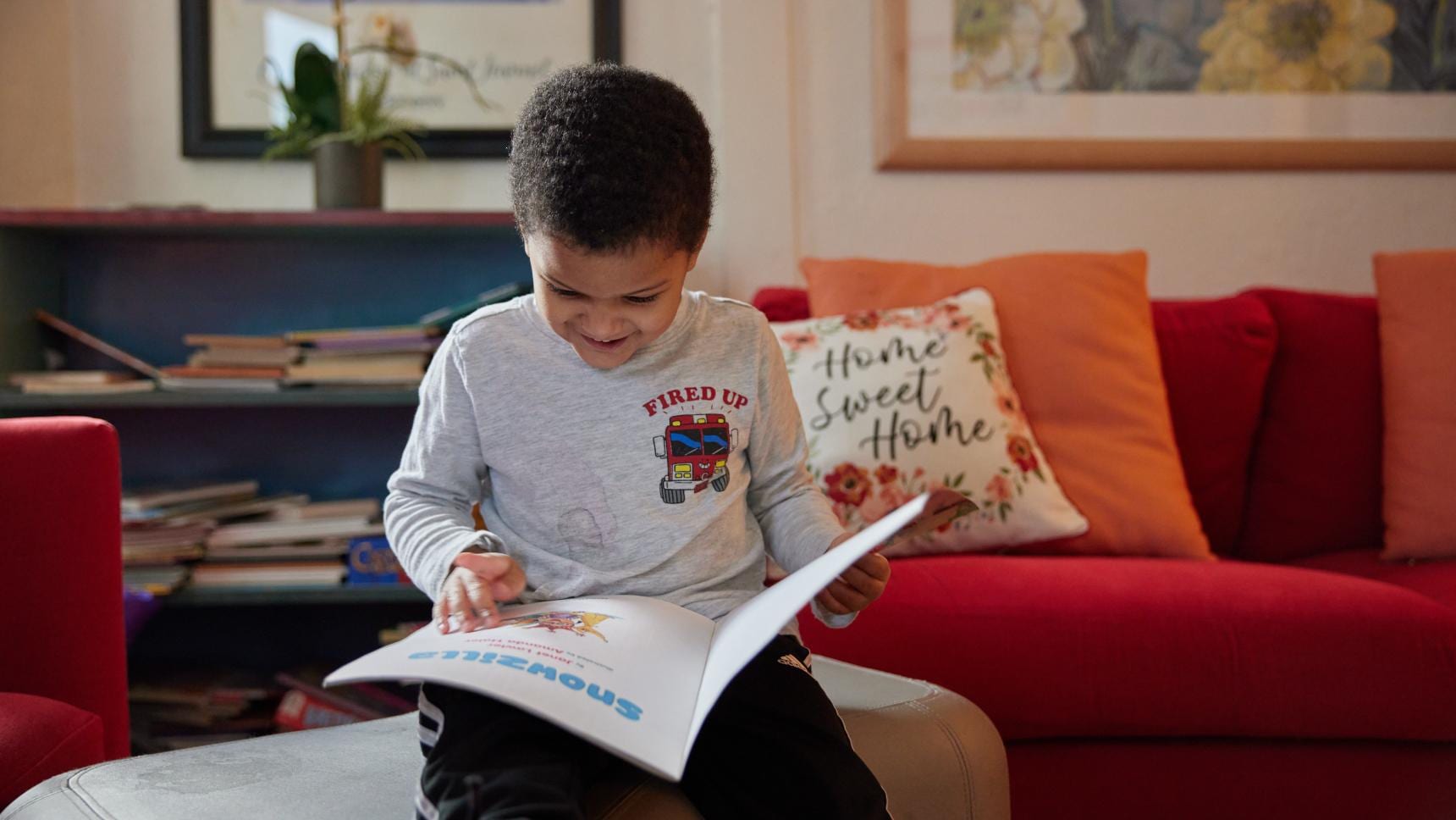 A young child reading a book