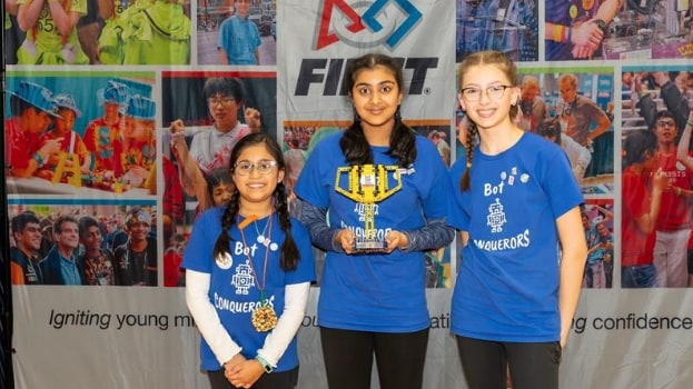 (slide 1 of 5) Our LEGO Robotics team, the Bot Conquerors. 