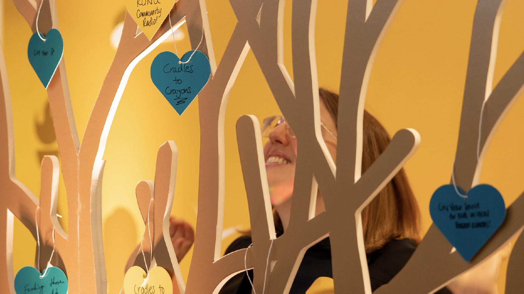 Liberty Mutual artificial giving tree with heart ornaments
