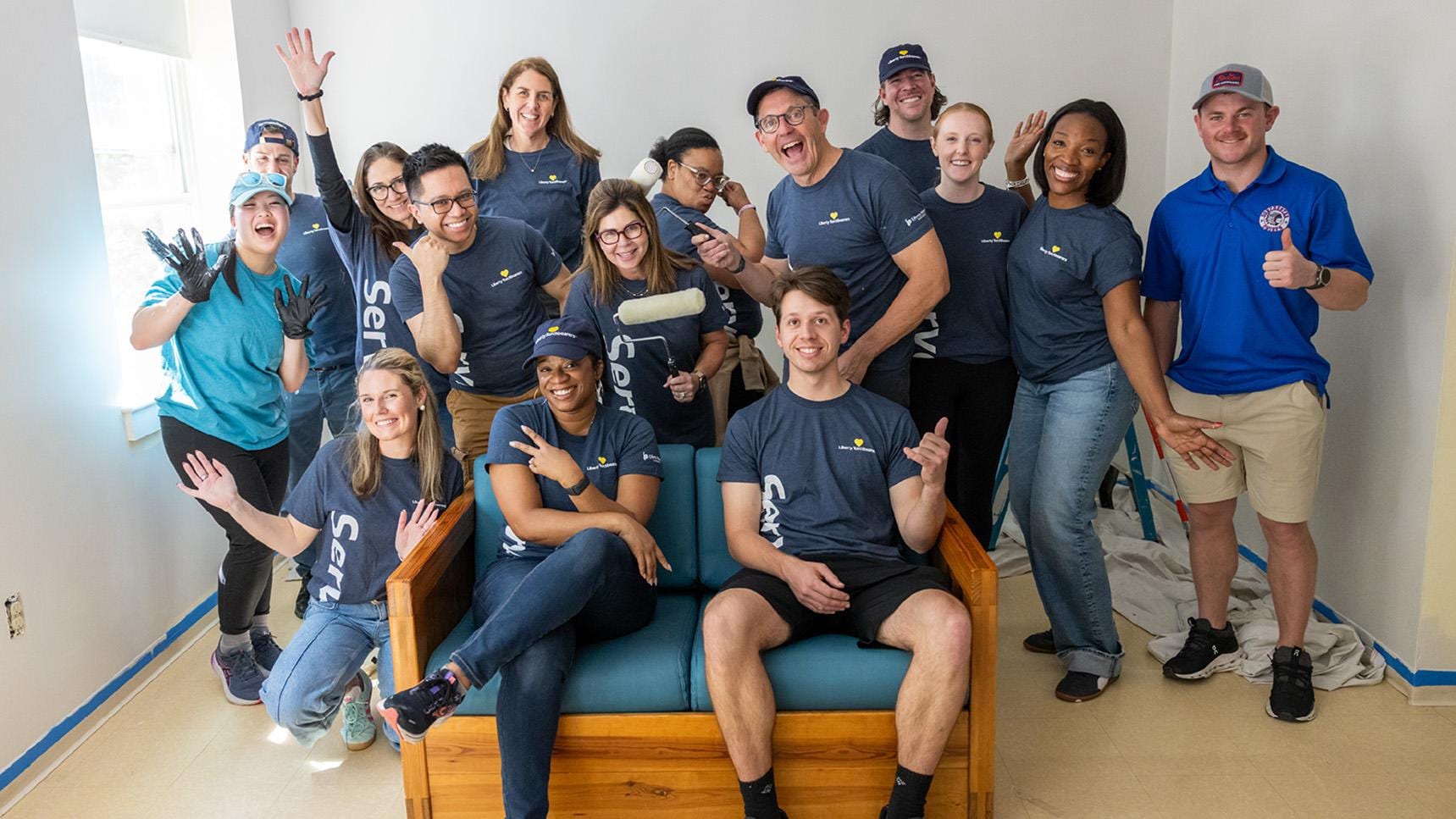 (slide 2 of 5) Group photo of LM Employees volunteering as part of Serve with Liberty. 