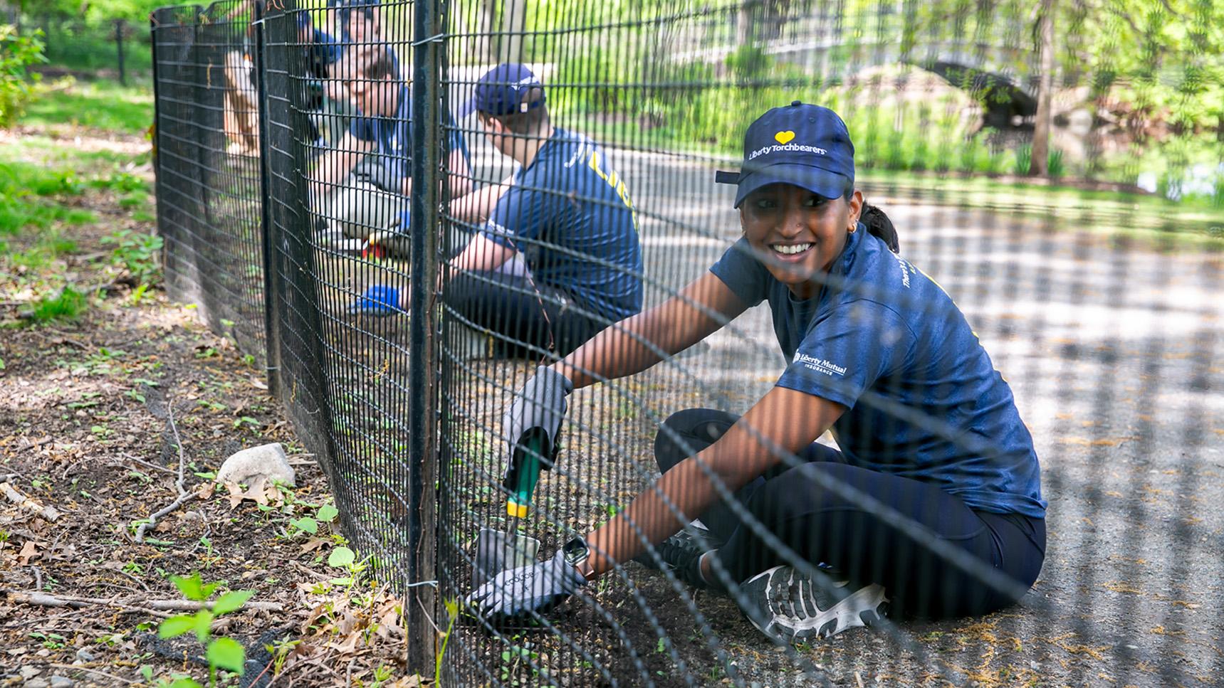 (slide 4 of 5) Group photo of LM Employees volunteering as part of Serve with Liberty. 