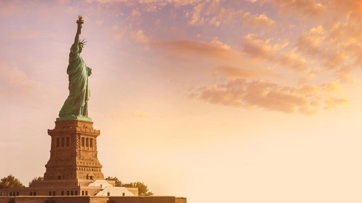 Sunset view of Statue of Liberty